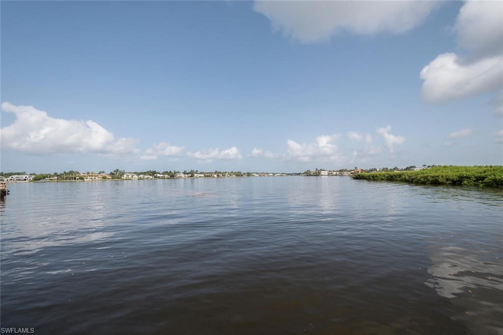3520 Windjammer Circle, Unit 102 Naples, FL 34112 - Photo 26 of 26 a view of a lake view