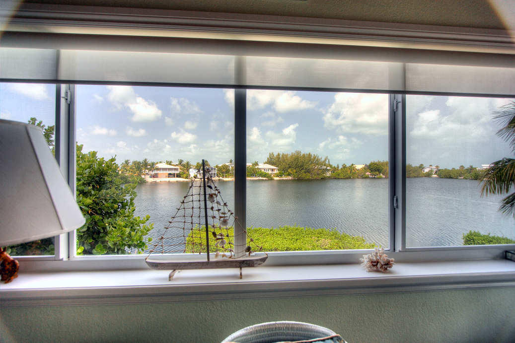 42 Mutiny Place Key Largo, FL 33037 - Photo 2 of 40 Lake views from West side of home