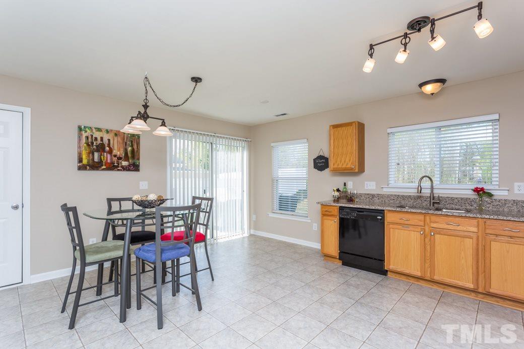 2629 Quarry Ridge Lane Raleigh, NC 27610 - Photo 5 of 12 a view of a dining room kitchen and a window