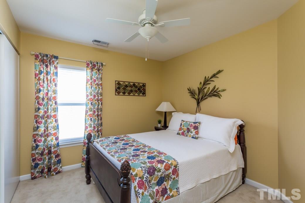 2629 Quarry Ridge Lane Raleigh, NC 27610 - Photo 10 of 12 a bedroom with a bed and a window