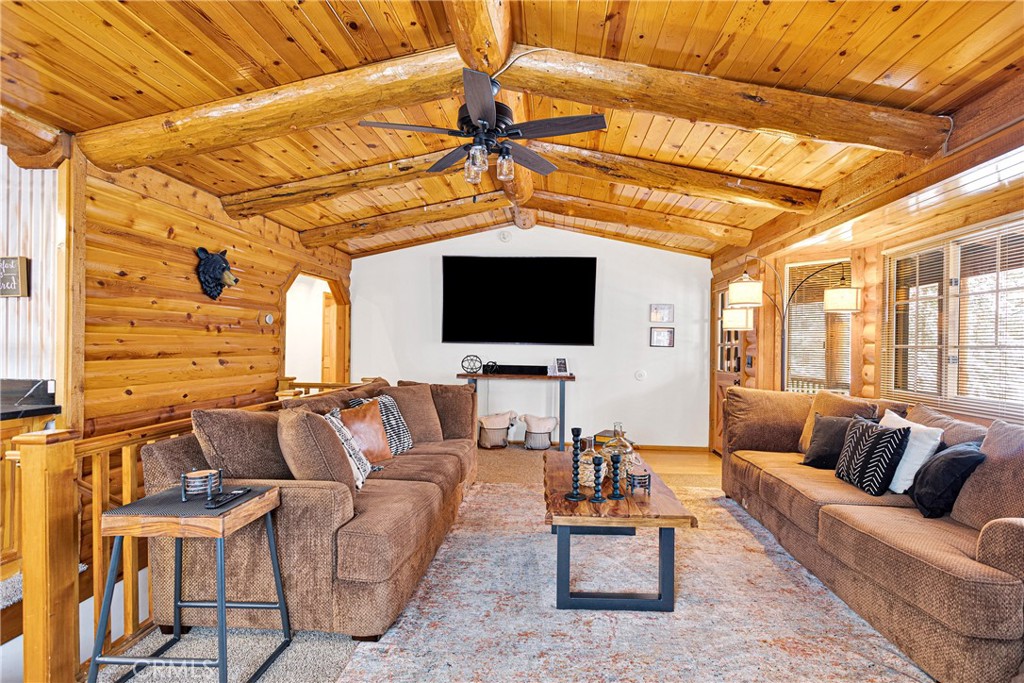 42363 Paramount Road Big Bear Lake, CA 92315 - Photo 11 of 58 a living room with furniture and a flat screen tv