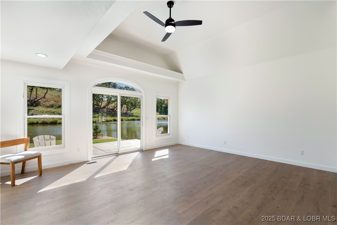 5488 Pebble Lane Osage Beach, MO 65065 - Photo 22 of 66 natural light encompasses the main level master su