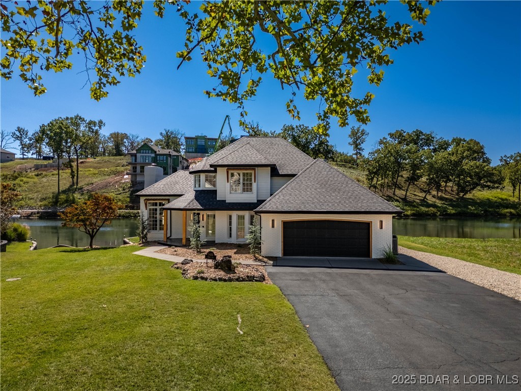 5488 Pebble Lane Osage Beach, MO 65065 - Photo 6 of 66 FLAT driveway!