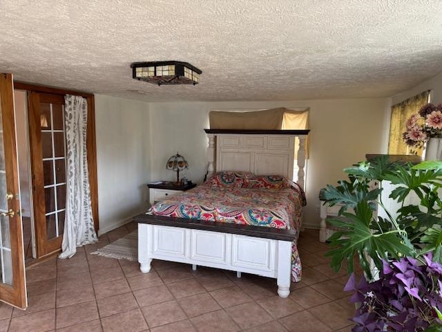275 Fritton Spur Road Middleton, TN 38052 - Photo 11 of 23 a bedroom with a bed and a potted plant