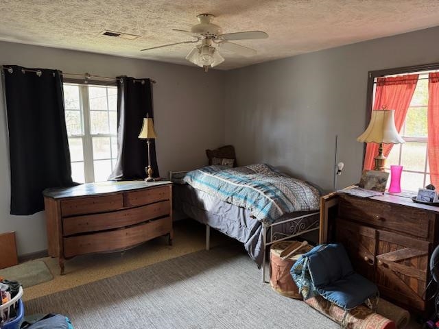 275 Fritton Spur Road Middleton, TN 38052 - Photo 12 of 23 a bedroom with a bed dresser and a window