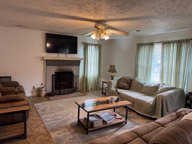 275 Fritton Spur Road Middleton, TN 38052 - Photo 5 of 23 a living room with furniture and a fireplace
