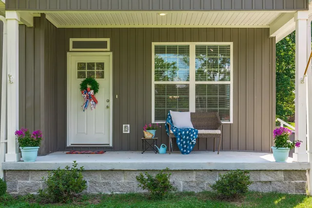a front view of a house with garden