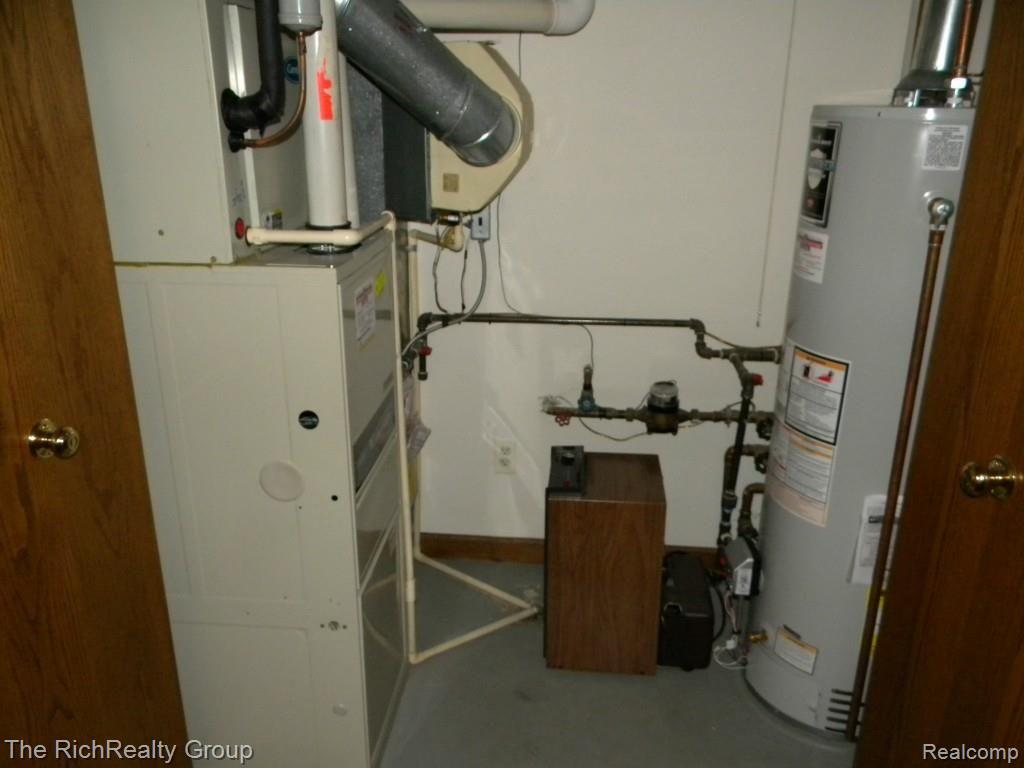 3116 Rivers Edge Drive Wayne, MI 48184 - Photo 32 of 33 Furnace and Hotwater Tank in Basement.