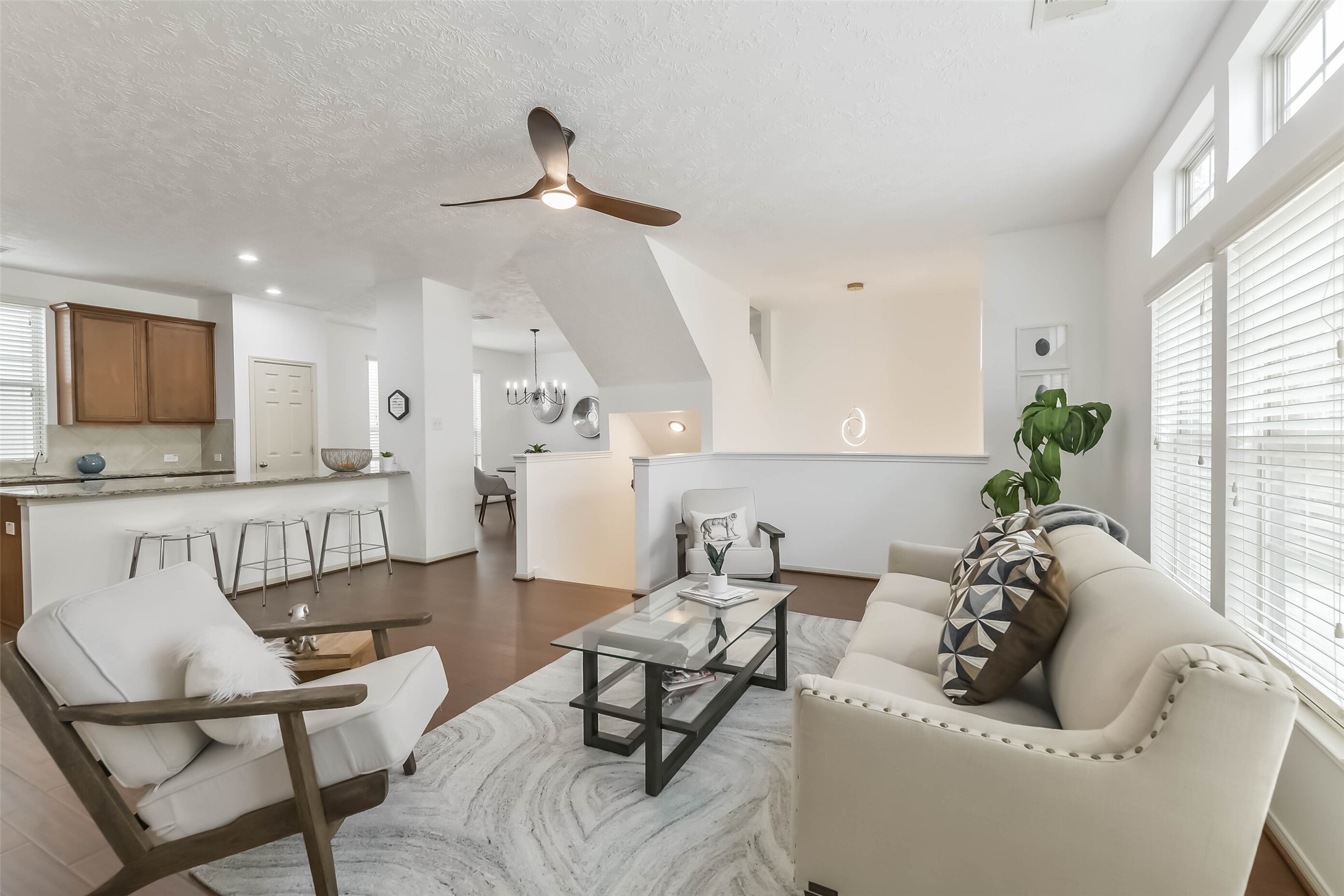 3324 Masters Point Drive Houston, TX 77091 - Photo 12 of 40 a living room with furniture and kitchen view