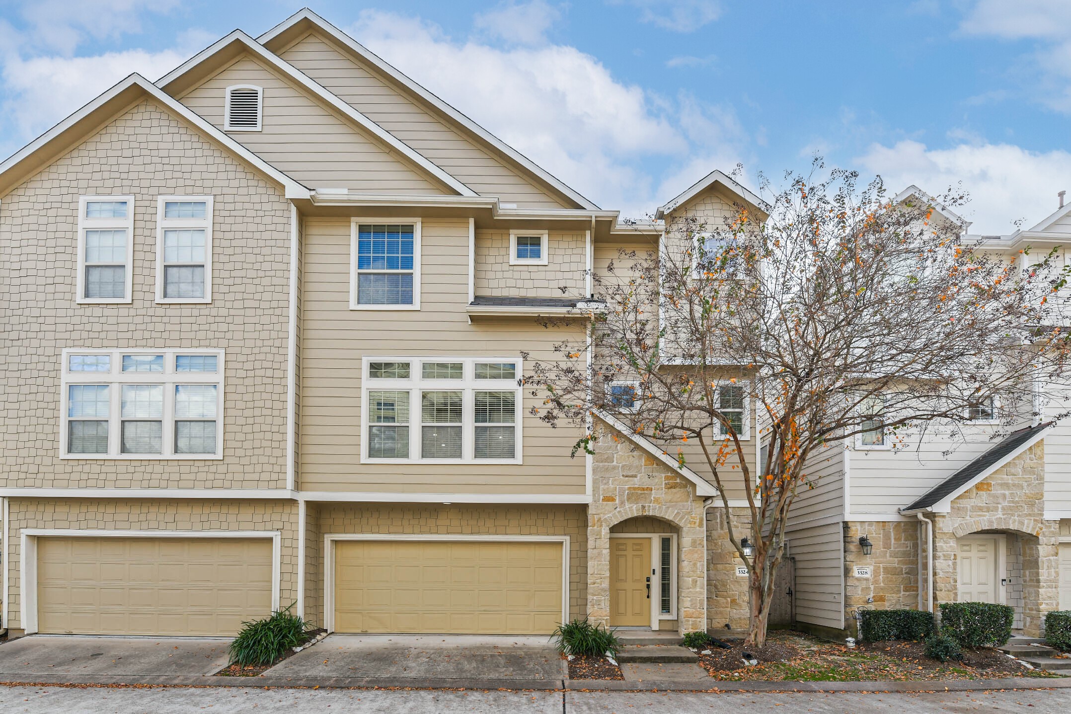 3324 Masters Point Drive Houston, TX 77091 - Photo 2 of 40 a front view of a house with a yard