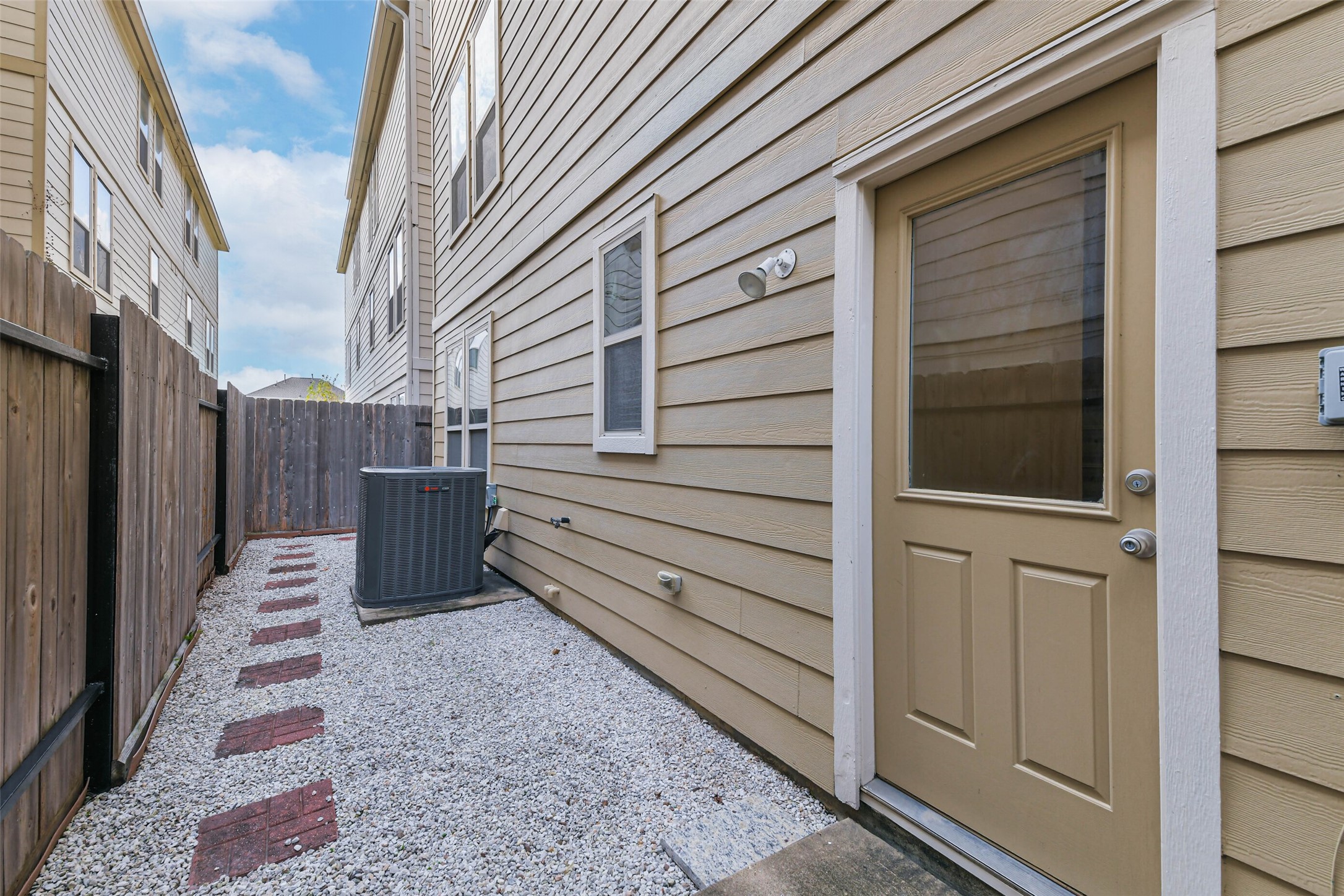 3324 Masters Point Drive Houston, TX 77091 - Photo 36 of 40 a view of a house with a door