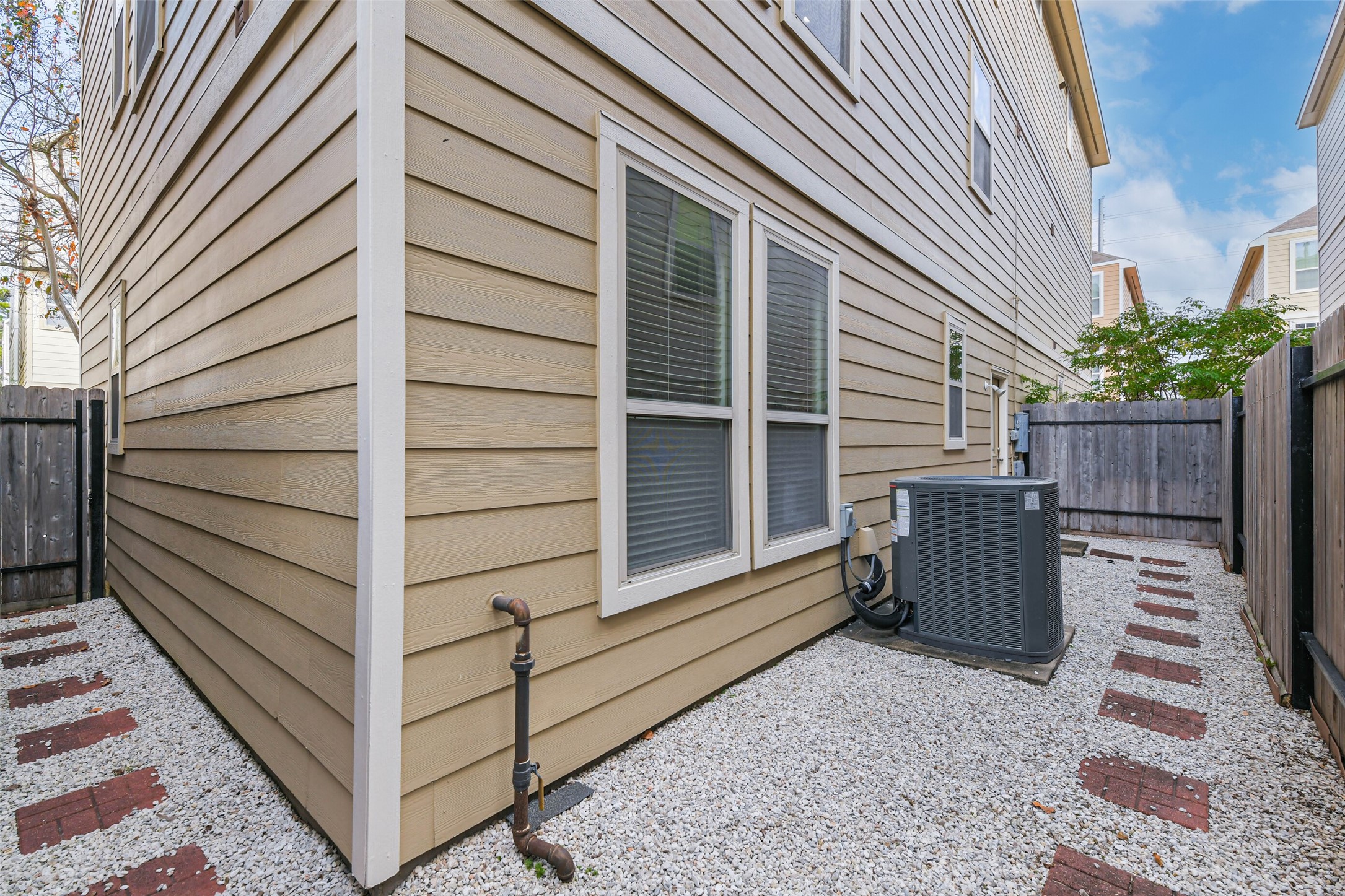 3324 Masters Point Drive Houston, TX 77091 - Photo 37 of 40 a view of a house with backyard and wooden fence