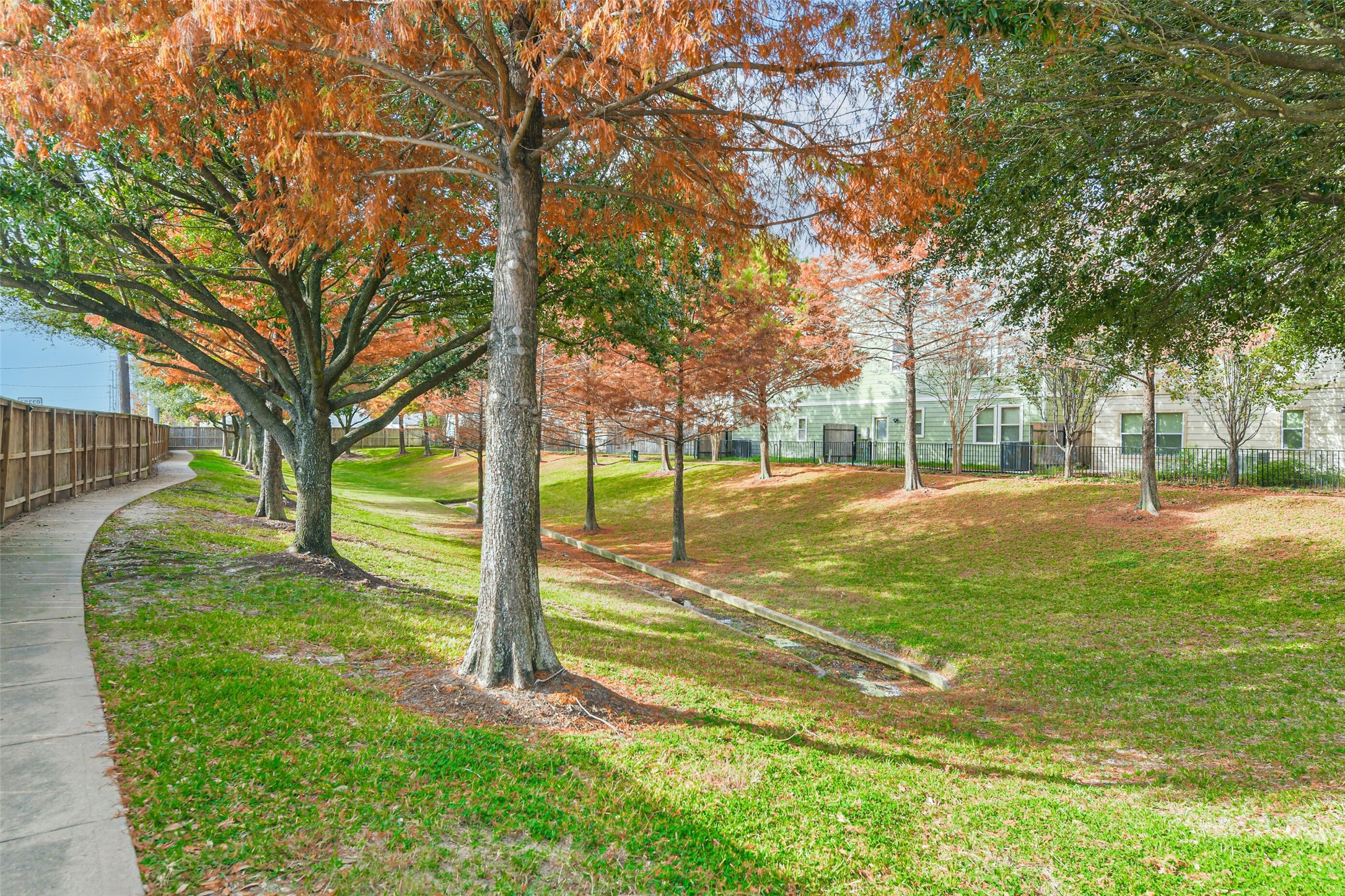 3324 Masters Point Drive Houston, TX 77091 - Photo 38 of 40 a view of a yard with a tree
