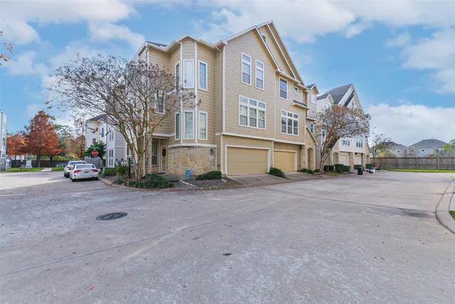 a view of a street with a houses