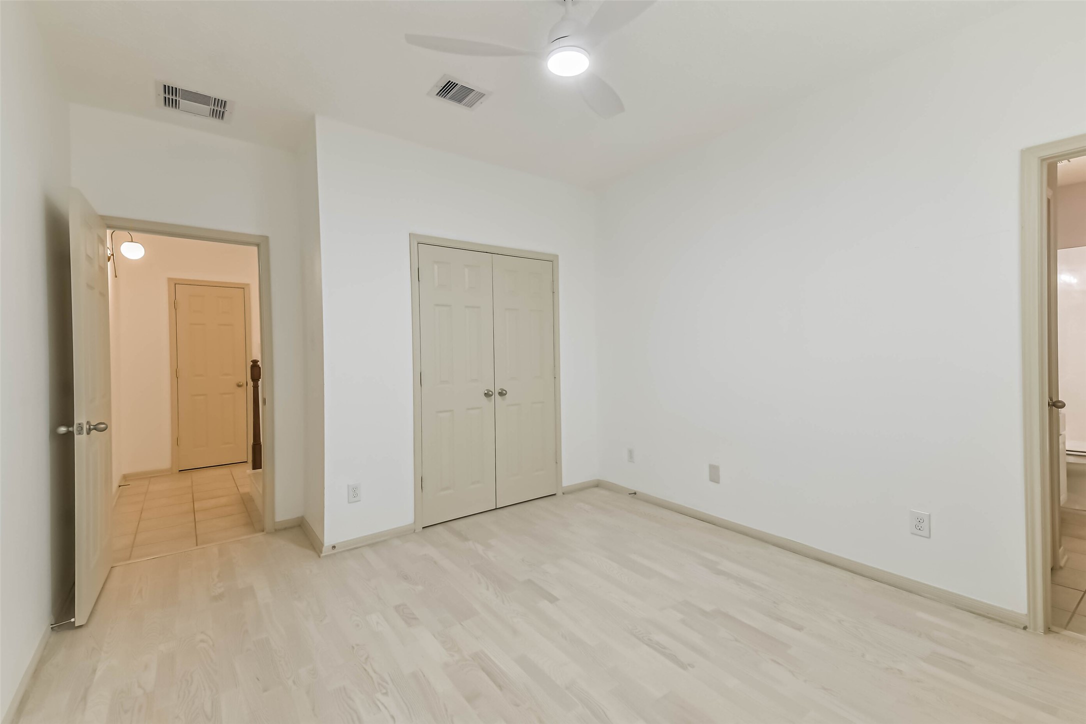 3324 Masters Point Drive Houston, TX 77091 - Photo 7 of 40 wooden floor in an empty room