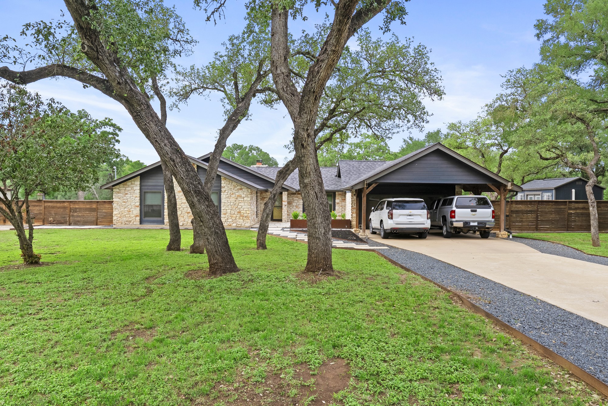 2802 Robin Road Manchaca, TX 78652 - Photo 5 of 40 Single-story residence featuring a stone and dark siding exterior