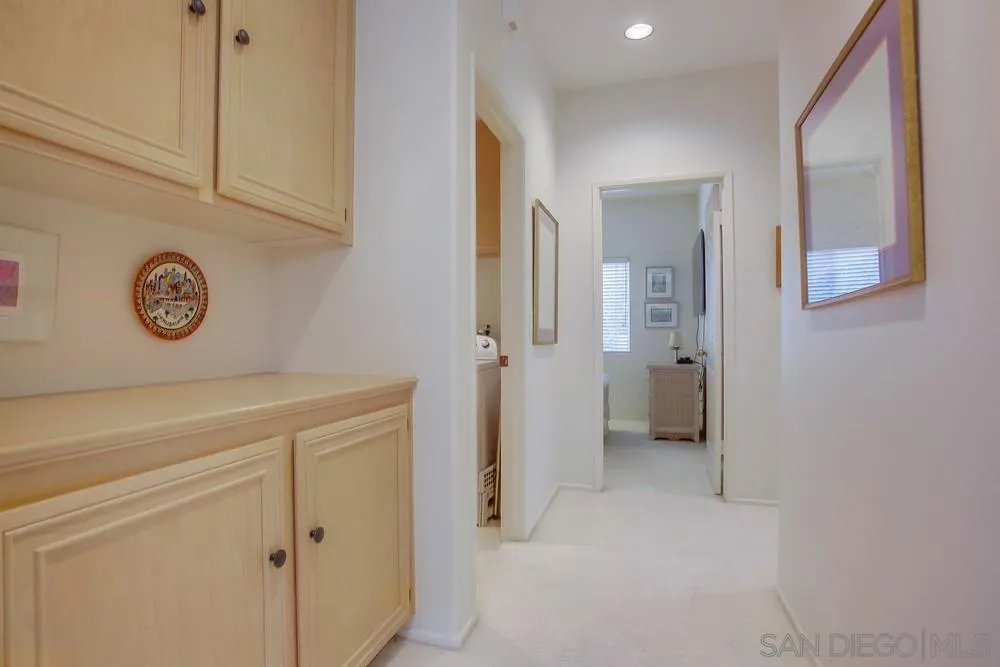 793 Poppy Road San Marcos, CA 92078 - Photo 19 of 38 a view of a hallway with closet