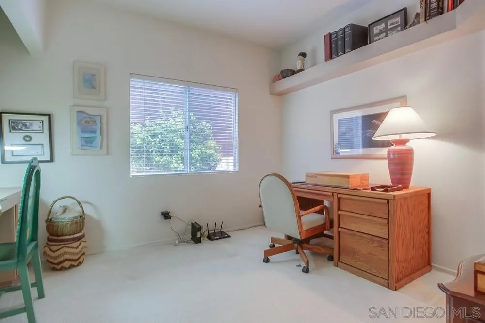 793 Poppy Road San Marcos, CA 92078 - Photo 23 of 38 a view of a workspace with furniture and a window