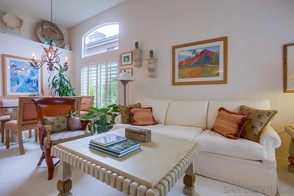 793 Poppy Road San Marcos, CA 92078 - Photo 3 of 38 a living room with furniture and a chandelier