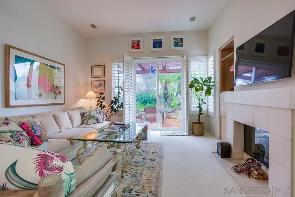 793 Poppy Road San Marcos, CA 92078 - Photo 7 of 38 a living room with furniture and a fireplace
