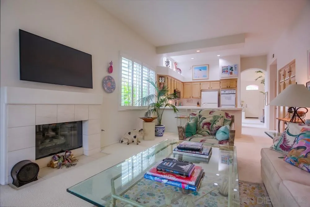 793 Poppy Road San Marcos, CA 92078 - Photo 9 of 38 a living room with furniture and a flat screen tv