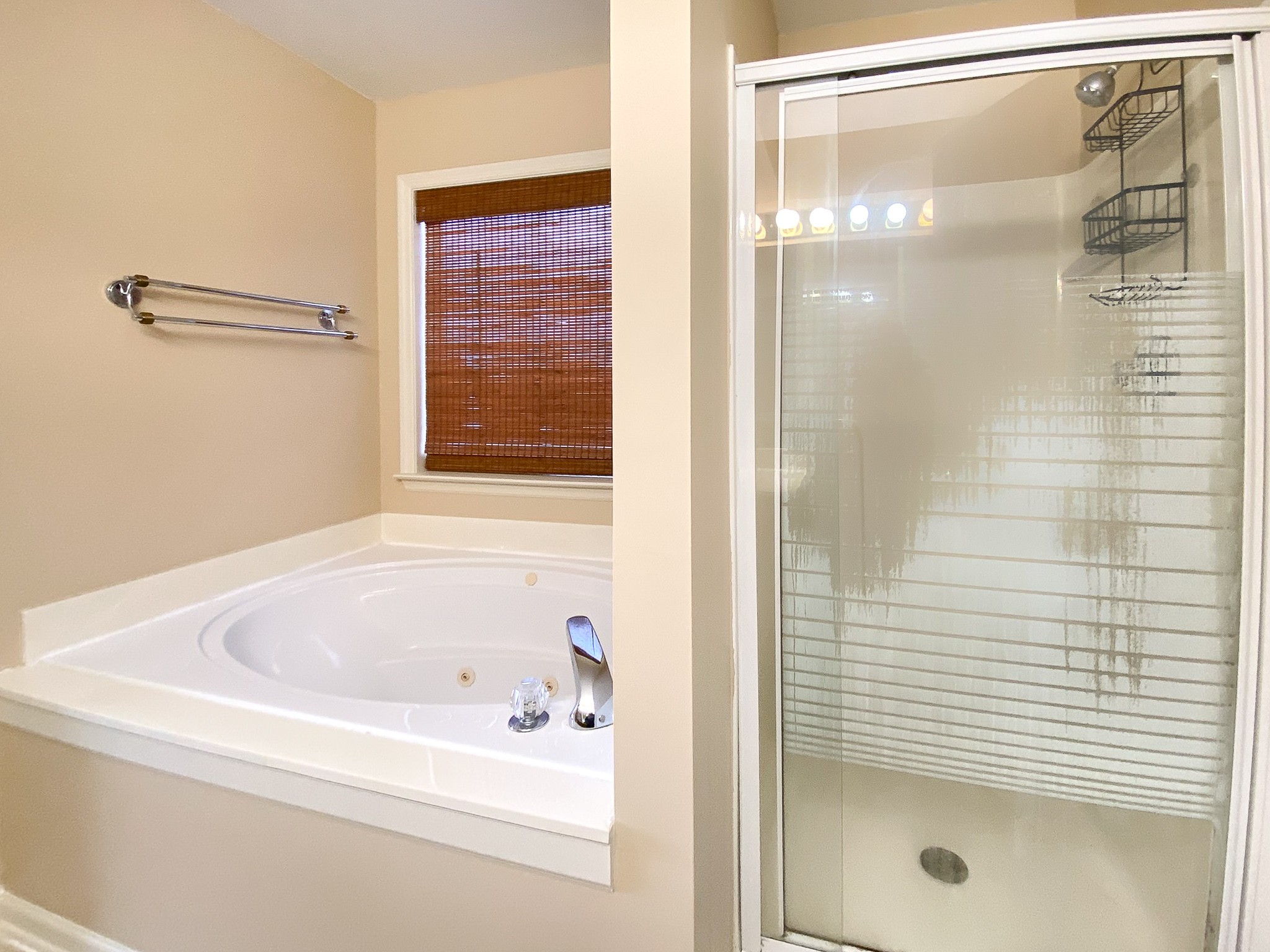 215 Falcon Drive Manchester, TN 37355 - Photo 15 of 25 a bathroom with a bathtub and shower