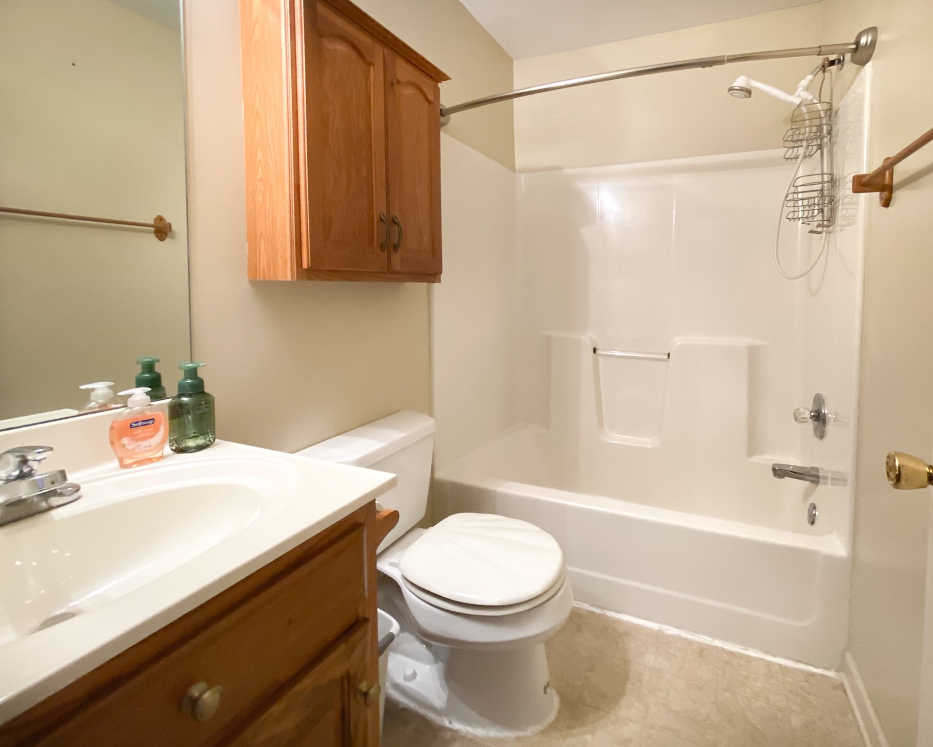 215 Falcon Drive Manchester, TN 37355 - Photo 20 of 25 a bathroom with a sink a toilet and shower