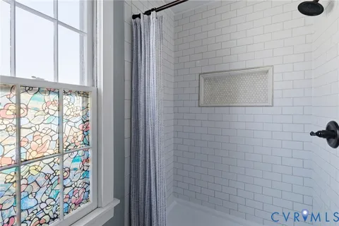 a bathroom with a window