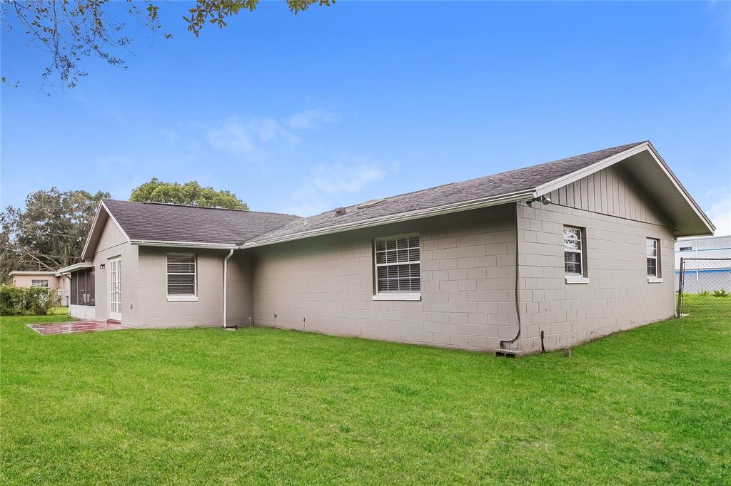2015 Jones Avenue Sanford, FL 32771 - Photo 14 of 16 a backyard of a house with lots of green space