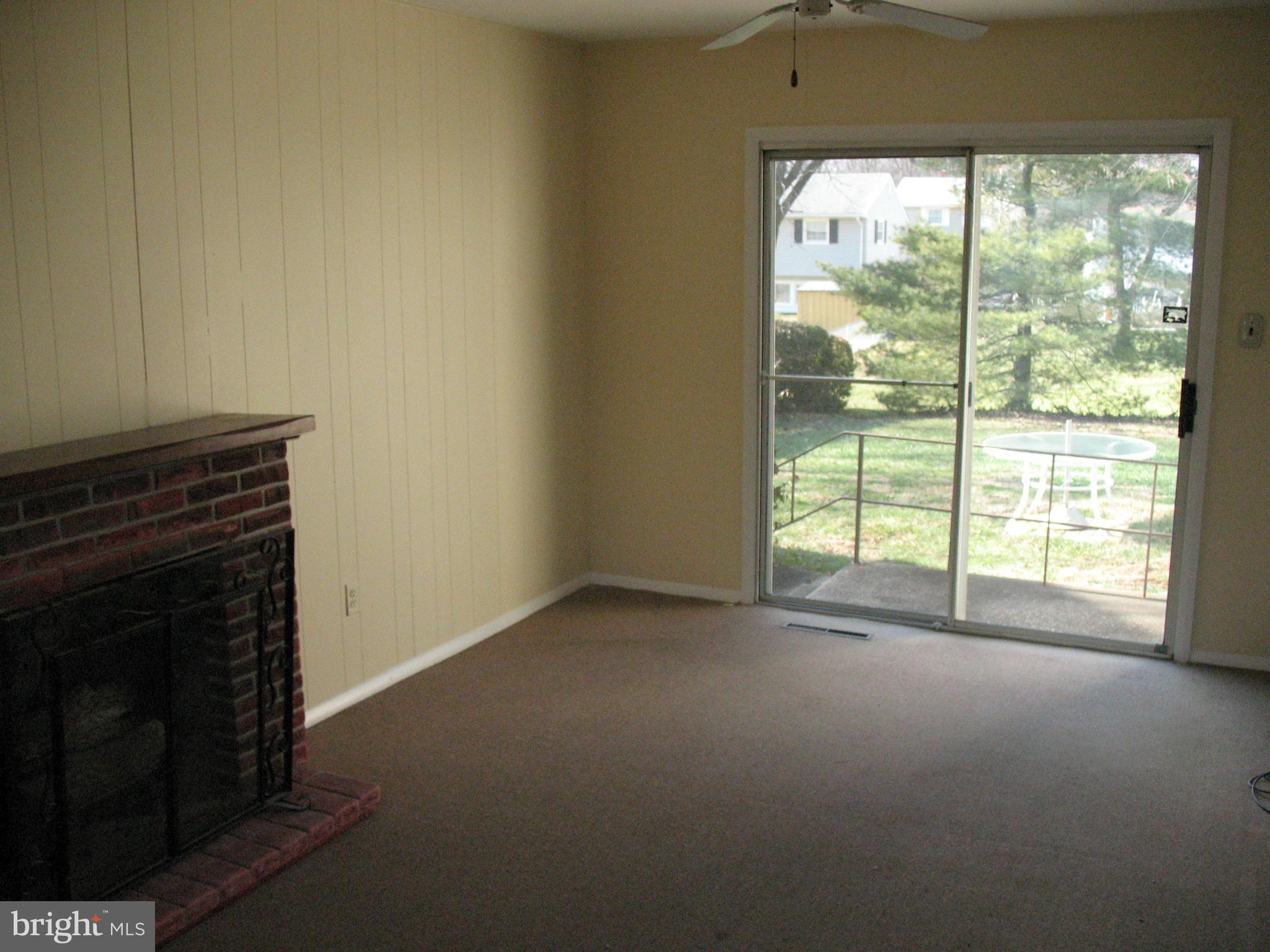 9012 Tammy Road Baltimore, MD 21236 - Photo 4 of 8 a view of empty room with floor to ceiling window