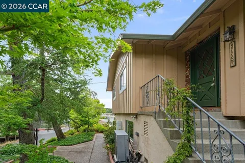 a house view with a outdoor space