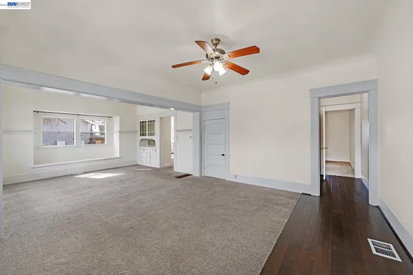 a view of an empty room and window