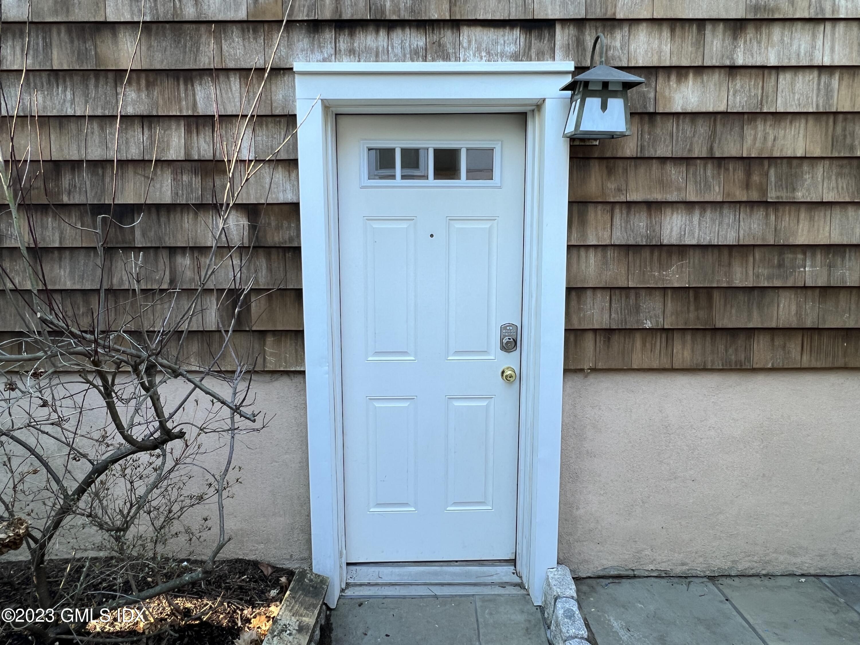 a view of a wooden cabinet and shelf