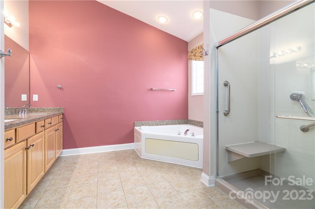 361 Garnet Court Fort Mill, SC 29708 - Photo 15 of 38 a bathroom with a sink a toilet and shower
