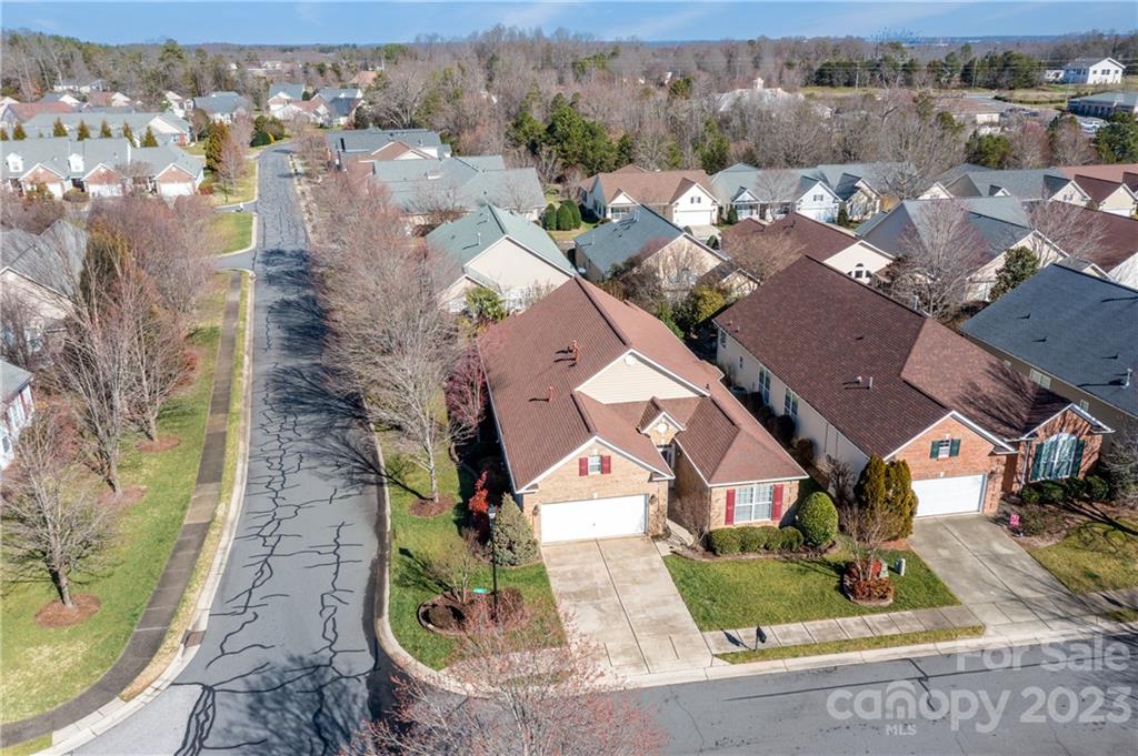 361 Garnet Court Fort Mill, SC 29708 - Photo 26 of 38 an aerial view of a house with a garden