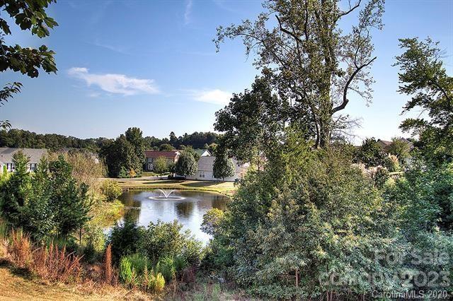 361 Garnet Court Fort Mill, SC 29708 - Photo 38 of 38 a view of a lake with trees in the background
