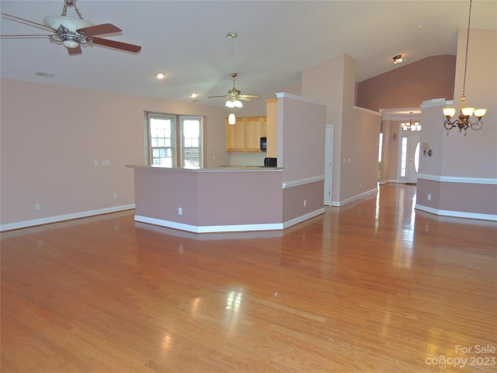 361 Garnet Court Fort Mill, SC 29708 - Photo 8 of 38 an empty room with wooden floor and windows