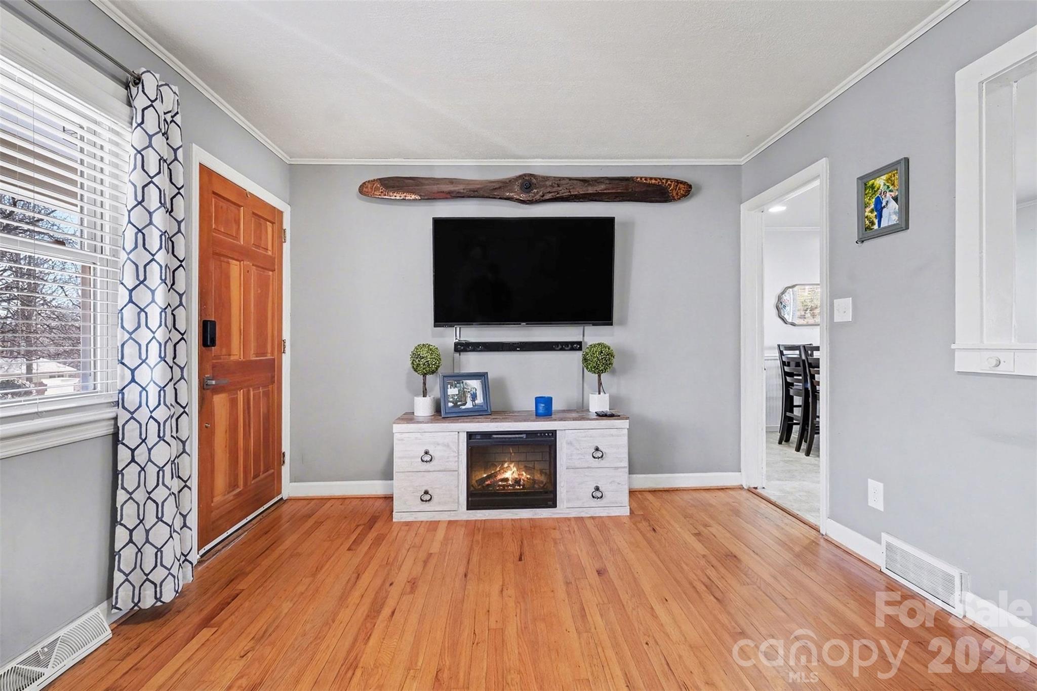 216 Malcolm Road Salisbury, NC 28144 - Photo 13 of 38 a view of a livingroom with furniture and a flat screen tv