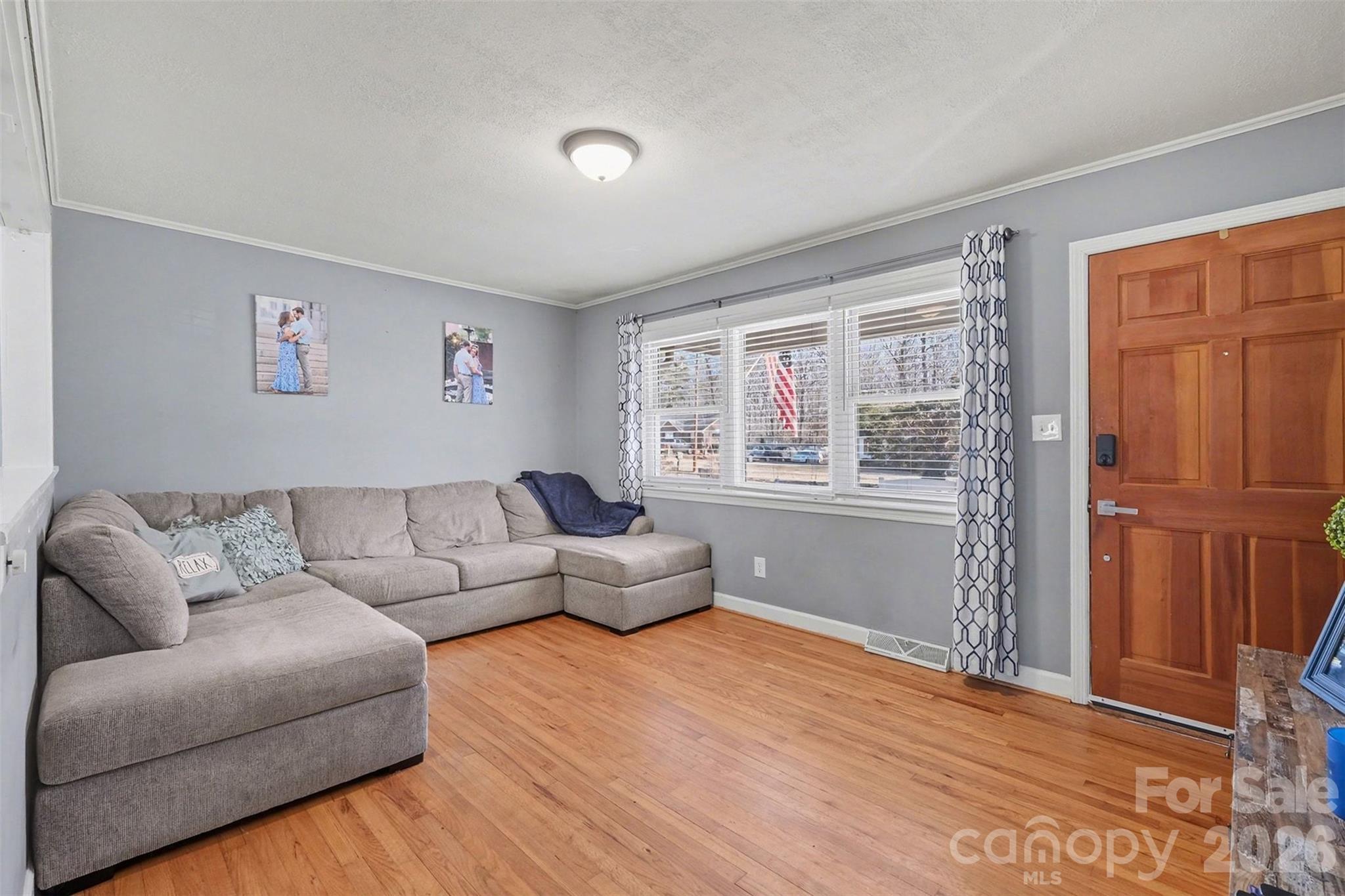 216 Malcolm Road Salisbury, NC 28144 - Photo 14 of 38 a living room with furniture and a window