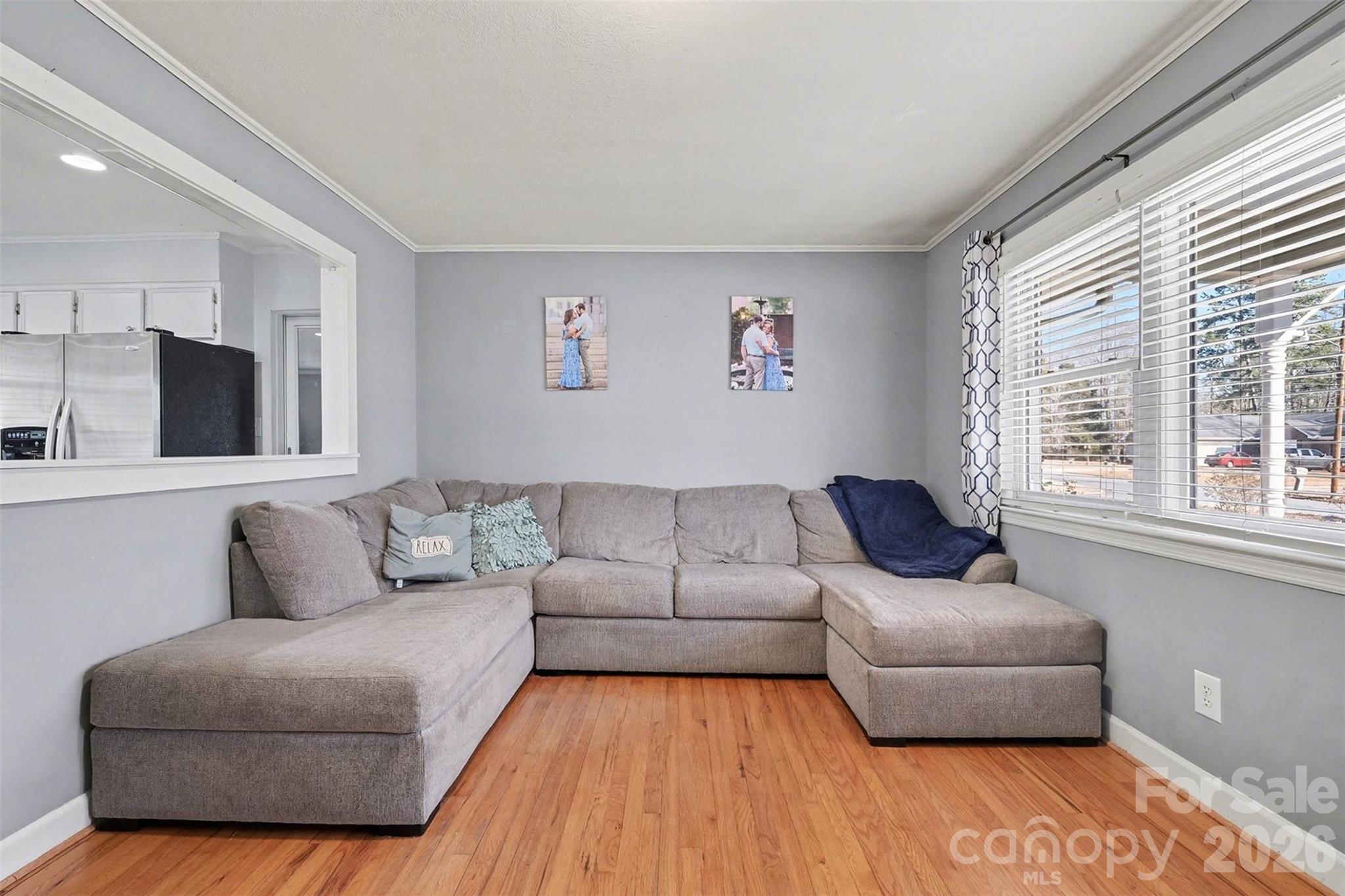 216 Malcolm Road Salisbury, NC 28144 - Photo 15 of 38 a living room with furniture and a flat screen tv