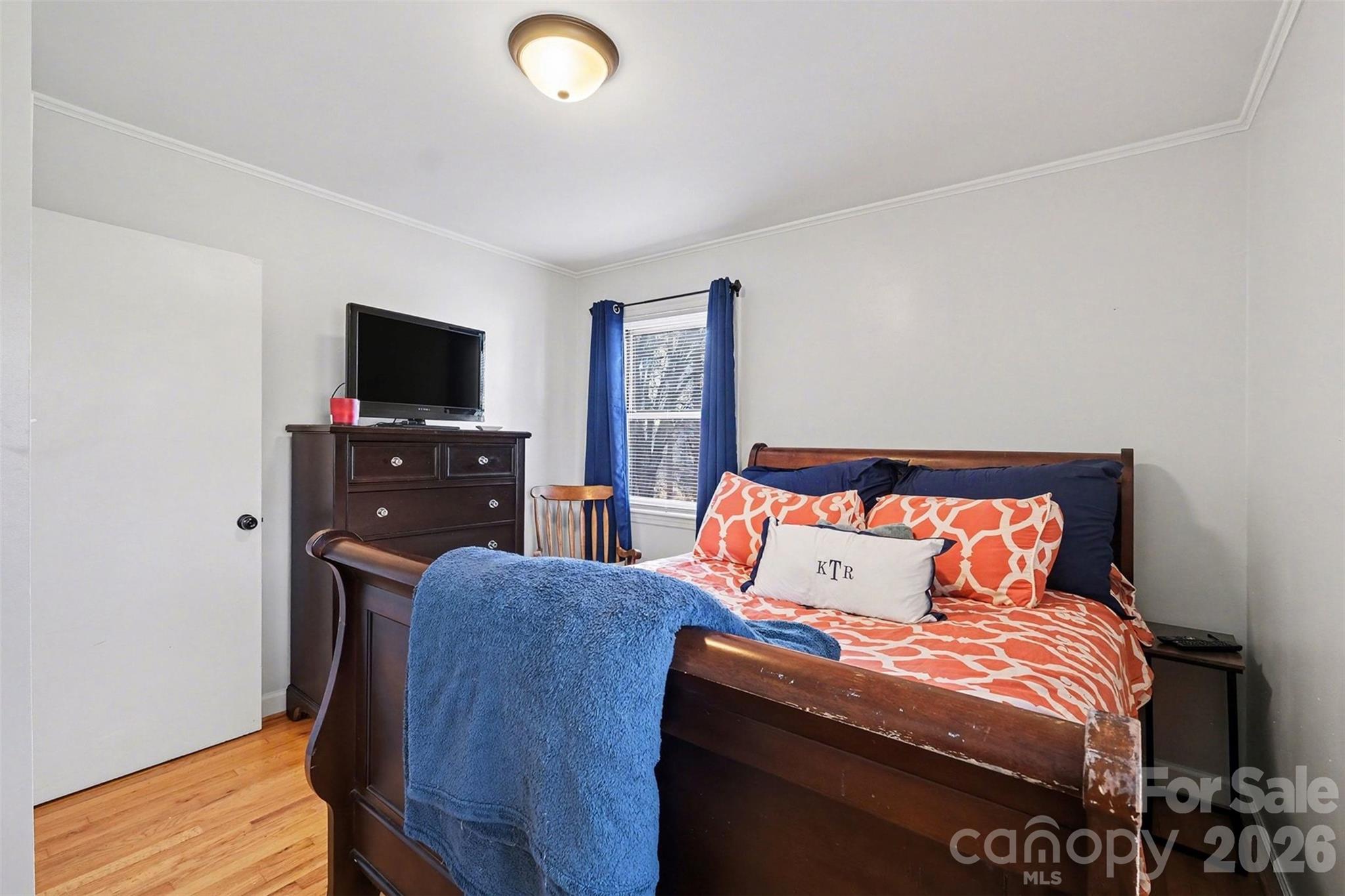 216 Malcolm Road Salisbury, NC 28144 - Photo 20 of 38 a bedroom with a bed and flat screen tv