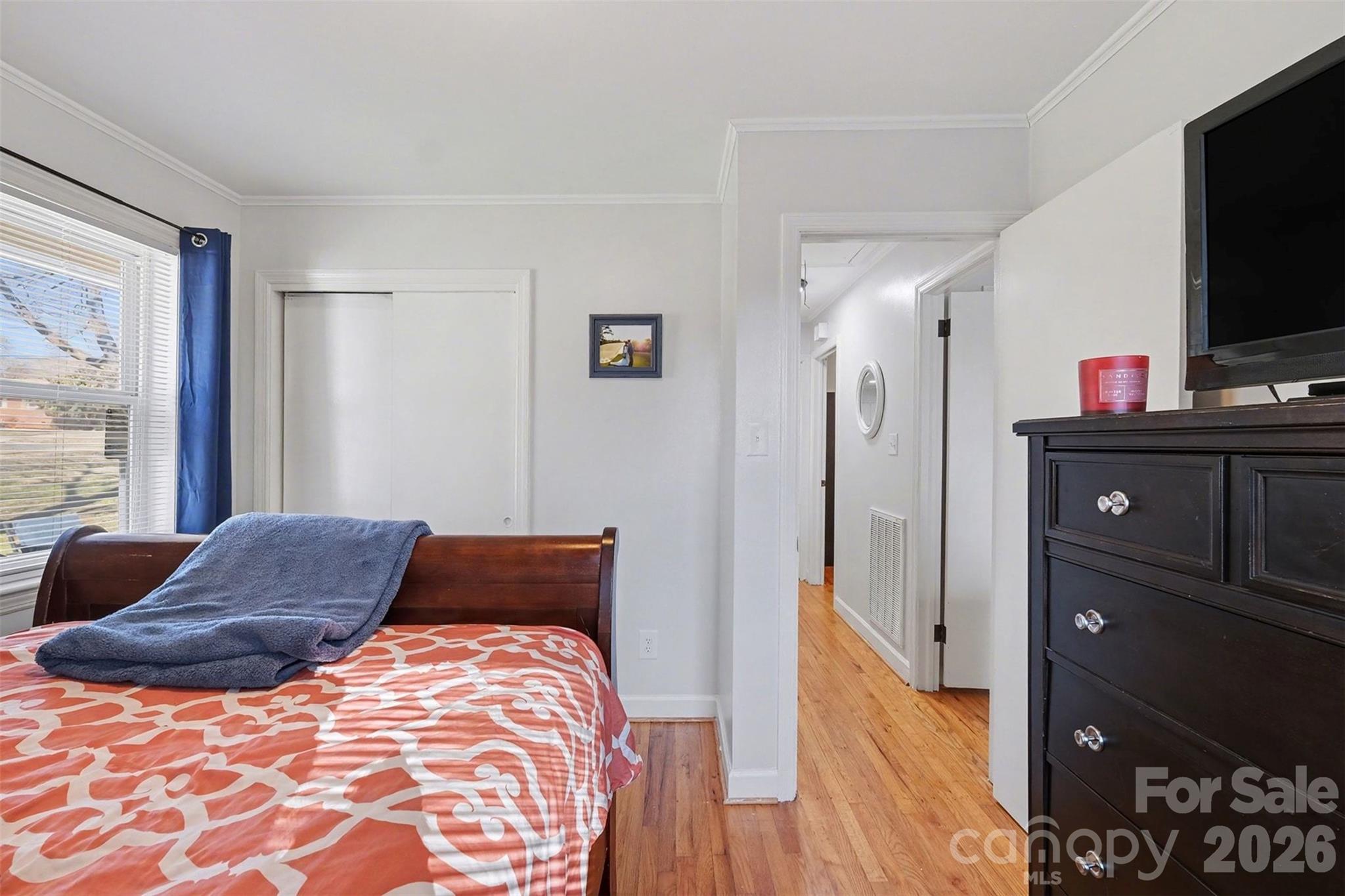 216 Malcolm Road Salisbury, NC 28144 - Photo 21 of 38 a bedroom with a bed and flat screen tv