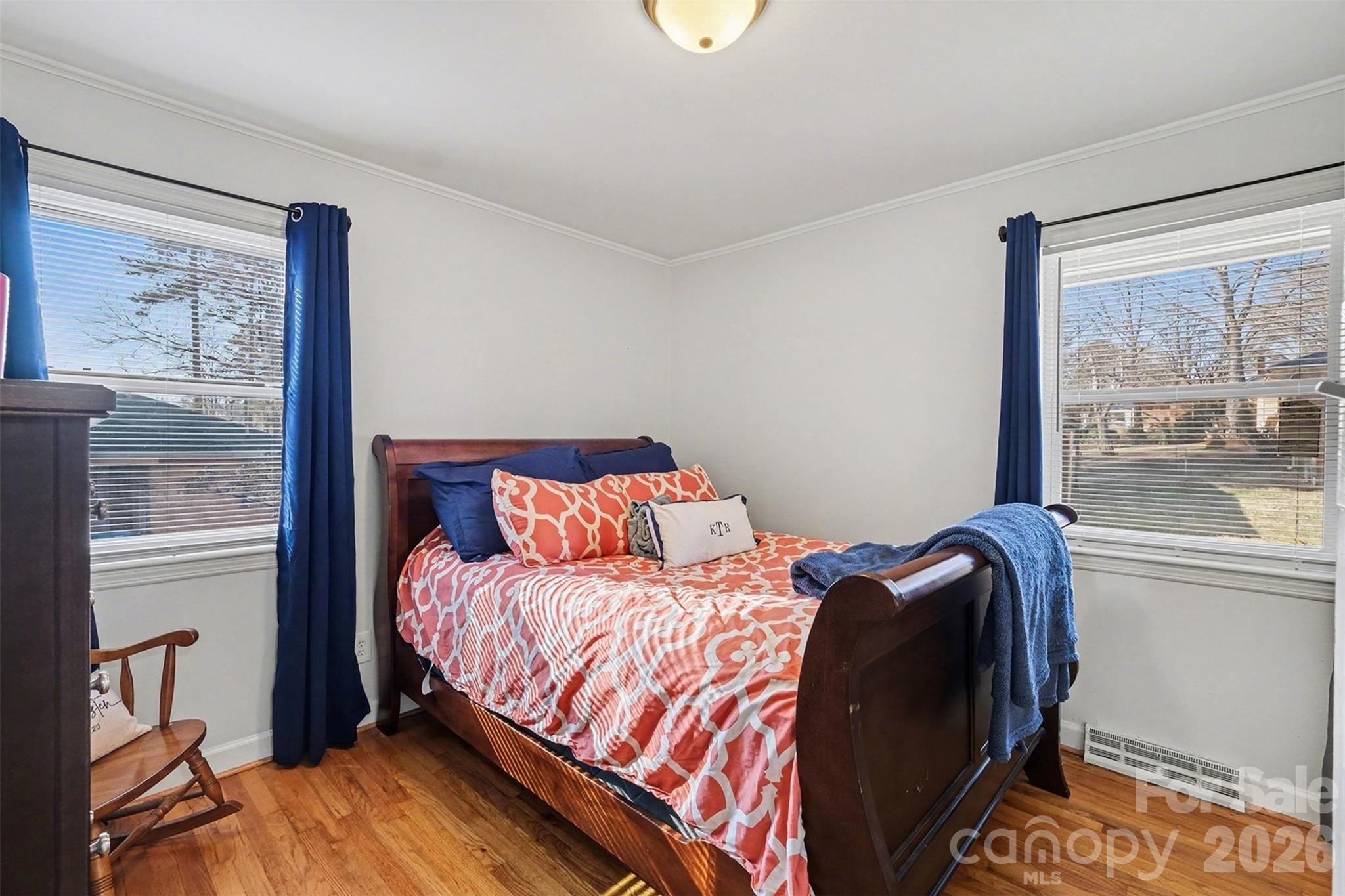 216 Malcolm Road Salisbury, NC 28144 - Photo 22 of 38 a bedroom with a bed and a large window