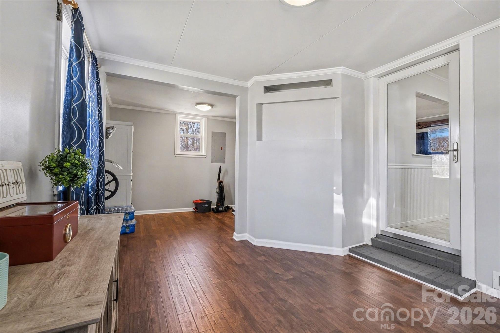 216 Malcolm Road Salisbury, NC 28144 - Photo 27 of 38 a view of a livingroom with wooden floor and furniture