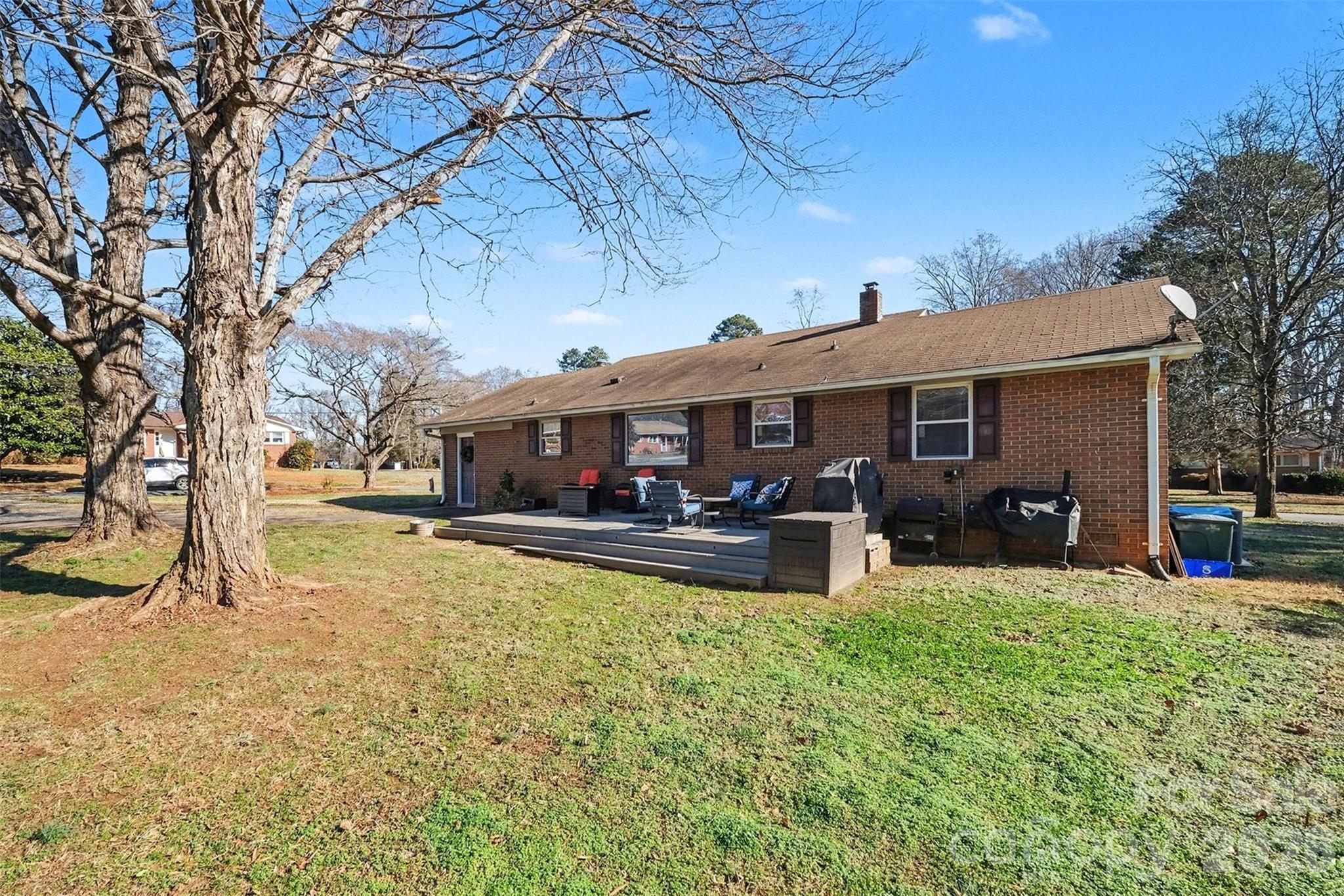 216 Malcolm Road Salisbury, NC 28144 - Photo 36 of 38 a view of a house with a big yard patio and a patio