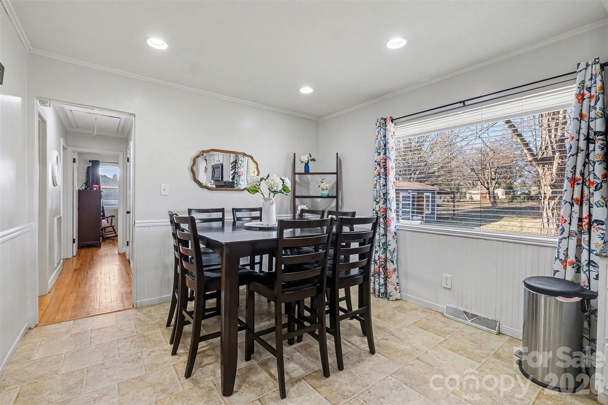 216 Malcolm Road Salisbury, NC 28144 - Photo 10 of 38 a view of a dining room with furniture window and outside view