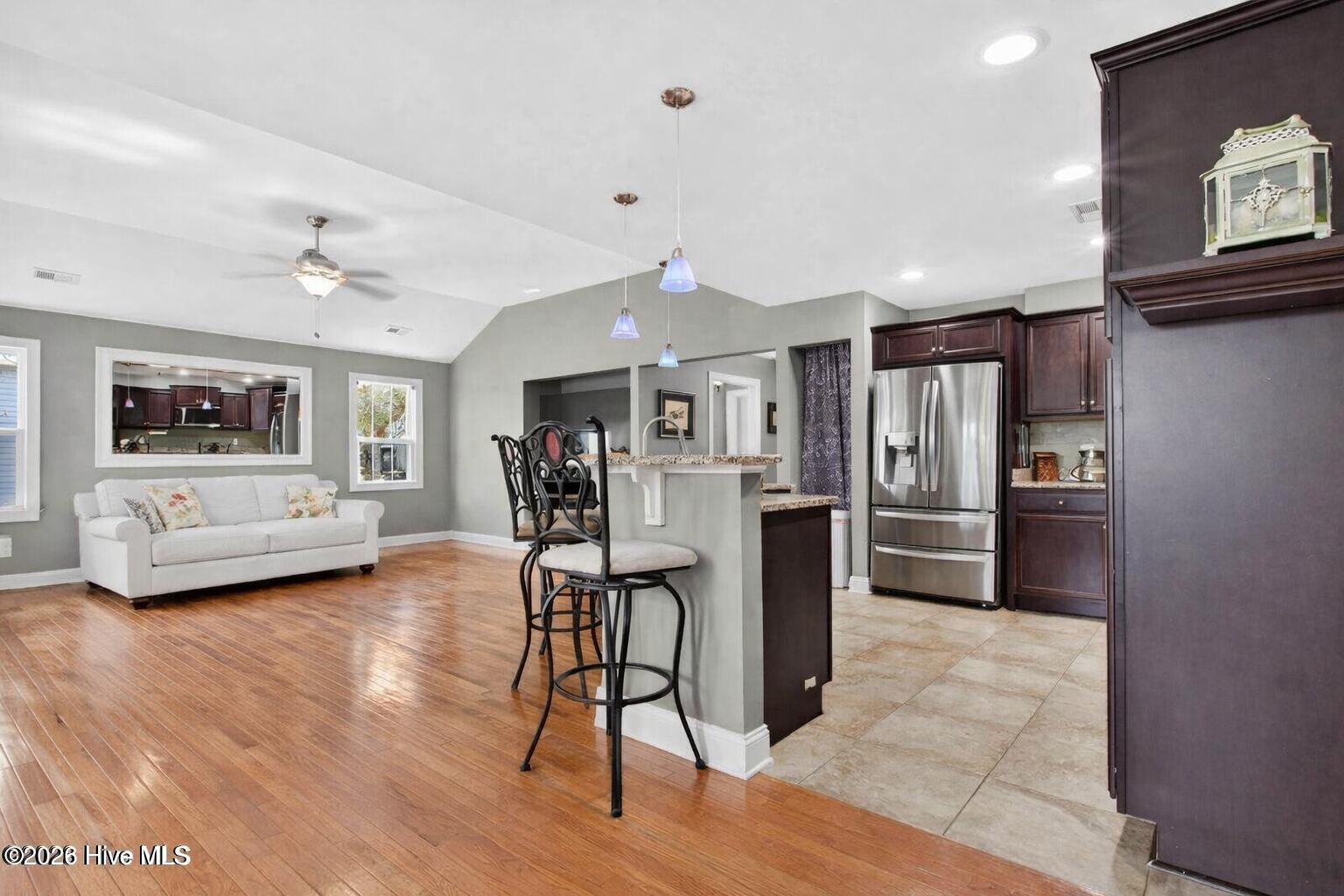 2020 Albemarle Road Southport, NC 28461 - Photo 11 of 61 Modern living room and kitchen blend