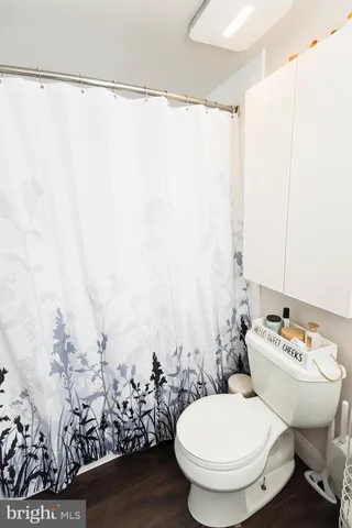 a bathroom with a sink and a washer dryer