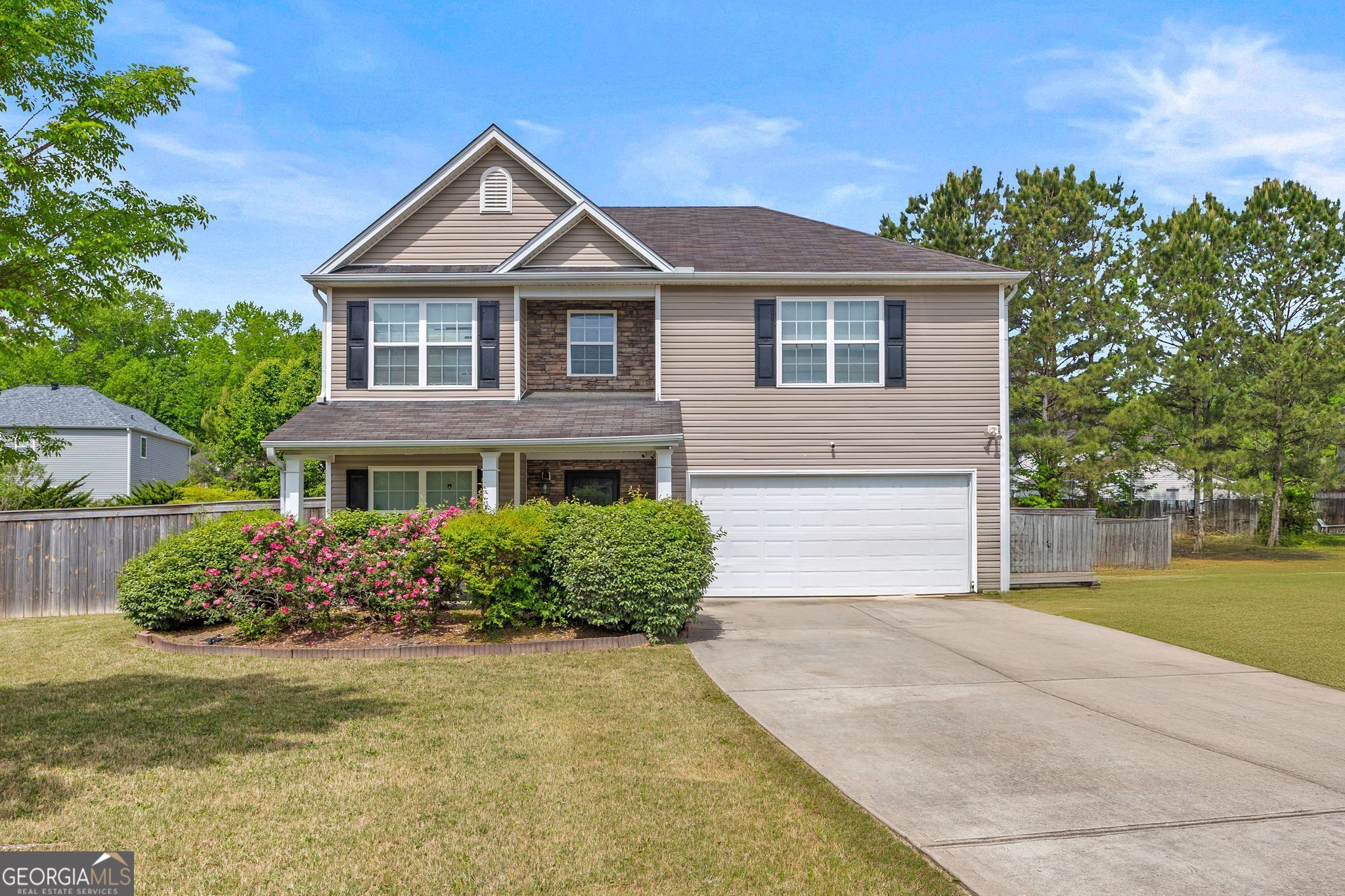 8264 Milam Loop Fairburn, GA 30213 - Photo 1 of 1 front view of a house with a yard
