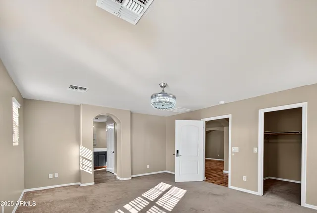 a view of livingroom with hallway and bathroom